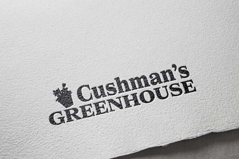 Embossed “Cushman’s Greenhouse” logo on textured paper